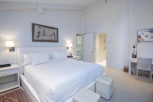 Katil atau katil-katil dalam bilik di Lionshead Center #304 condo