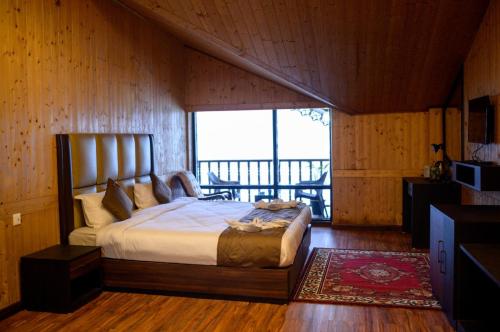 Postel nebo postele na pokoji v ubytování Istana Resort & Spa