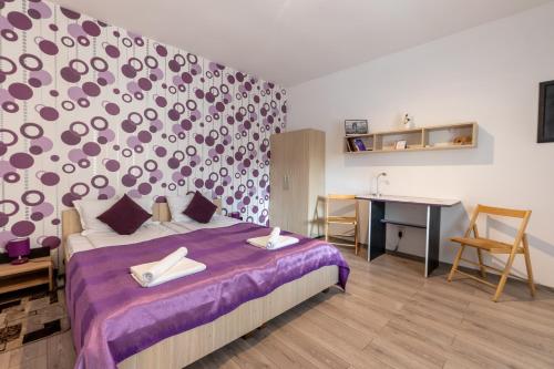 Giường trong phòng chung tại Nice & Cozy Apartments