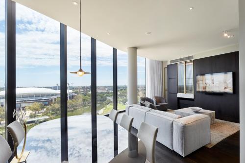 a hotel room with a view of the ocean at Eos by SkyCity in Adelaide
