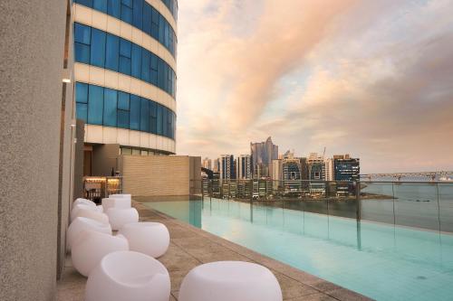 a view of the city from the rooftop of a building at Hotel Aqua Palace in Busan