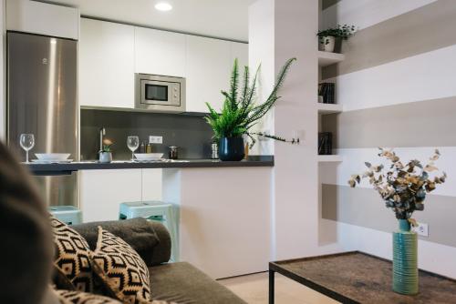Kuchyň nebo kuchyňský kout v ubytování Encarnación Suite Apartment