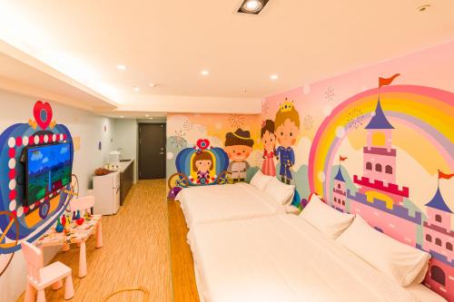 Postel nebo postele na pokoji v ubytování 閣樂親子旅宿Kids Fun Hotel