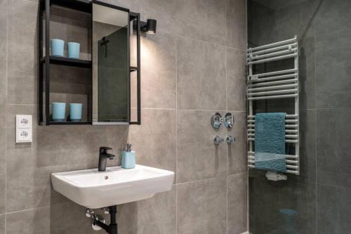 Ett badrum på MODERN WESTERN - Apartment BLUE