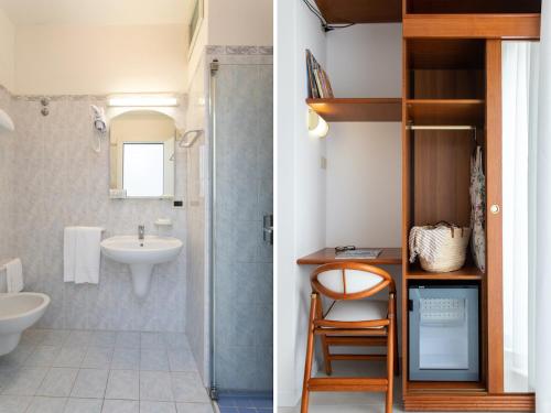 a bathroom with a sink and a toilet and a shower at Hotel Mirafiori in Lido di Jesolo