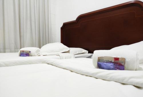 Postel nebo postele na pokoji v ubytování Motel lavapies
