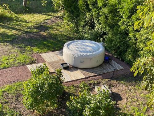 an igloo sitting on a wooden platform in a garden at Torggatan 54 in Mariehamn