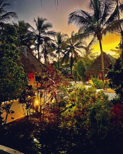 Taman di luar Milele Lodge