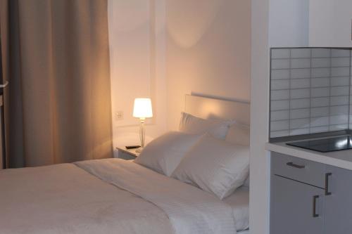 Кровать или кровати в номере My Home Star Apartments