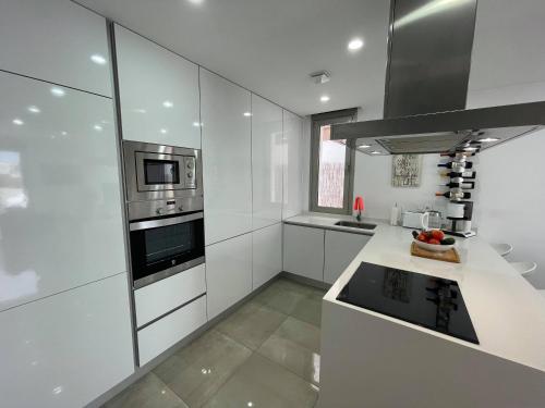 A kitchen or kitchenette at Casa Mordi