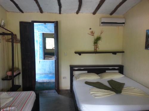 A bed or beds in a room at Casa Nova