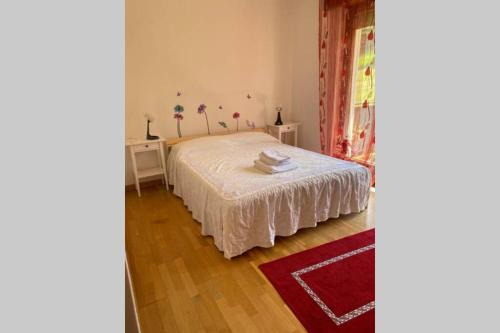 Кровать или кровати в номере Appartamento Giada e Mattia