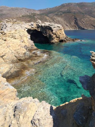 a large body of water on a rocky coast at Achelatis Traditional Guest Houses in Areopolis
