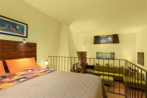 A bed or beds in a room at Toscana da Sogno a Villa Allegria
