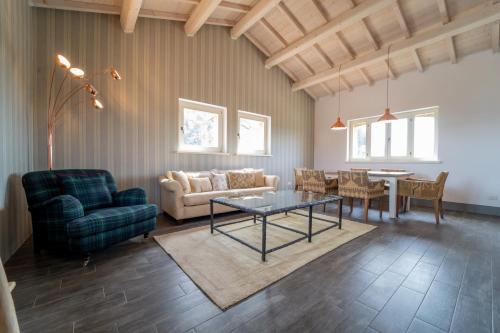 a living room with a couch and a table at Agriturismo Il Sarale - Umbria in Città di Castello