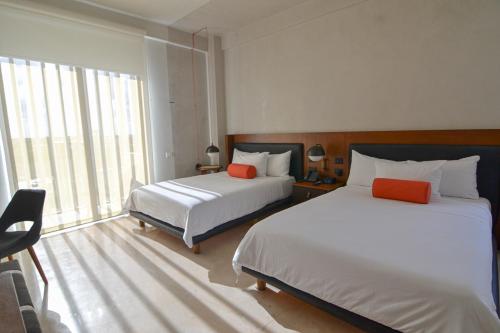 Postel nebo postele na pokoji v ubytování Mex Hoteles
