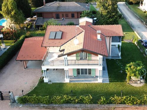 an aerial view of a house with red roofs at La Casa Della Volpe in Vedano Olona