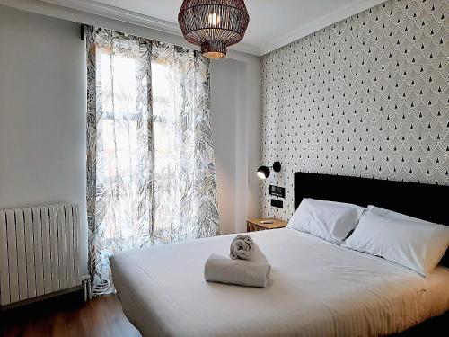 Posteľ alebo postele v izbe v ubytovaní Hotel Matilde by gaiarooms