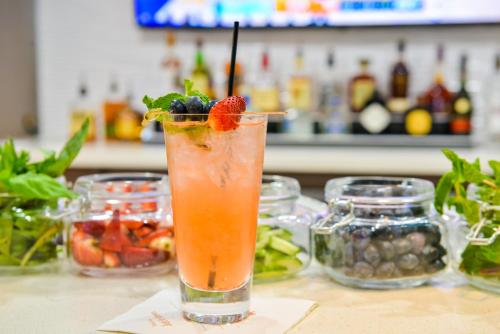 a drink sitting on a counter with fruits and vegetables at EVEN Hotel Seattle DTWN Lake Union, an IHG Hotel in Seattle