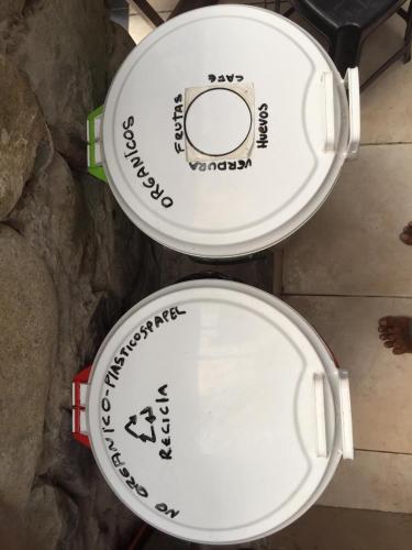 two white toilets sitting next to each other at Huanchaco Surf Camp in Huanchaco