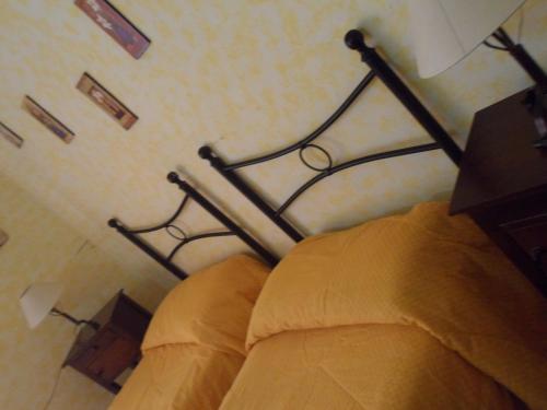 Postel nebo postele na pokoji v ubytování B&B Il Vecchio Messina