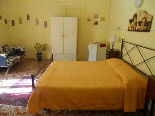 Postel nebo postele na pokoji v ubytování B&B Il Vecchio Messina