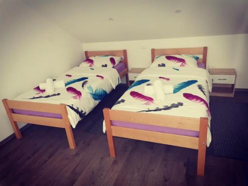 Postel nebo postele na pokoji v ubytování Apartmani "Marina"