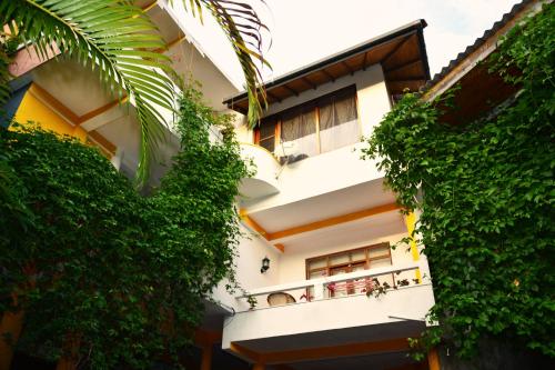 a view of a building from the street at VillaWatuna in Unawatuna