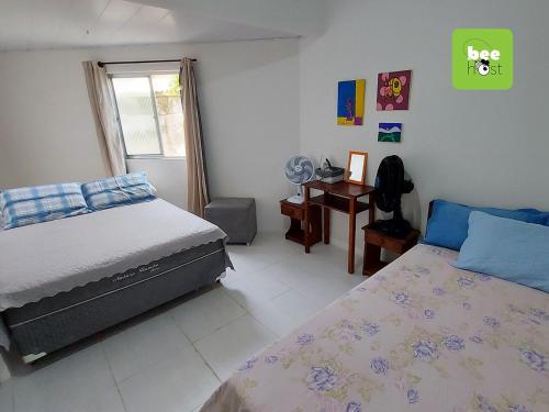 Ein Bett oder Betten in einem Zimmer der Unterkunft ONJAU0100 - Lindo village perto da praia de Jauá