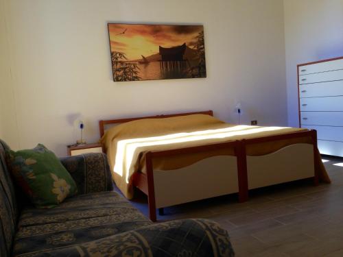 เตียงในห้องที่ Casa Ombry Gallipoli