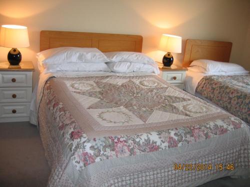 Cama o camas de una habitación en Birchwood B&B