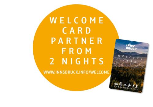 two books with the text welcome card partner from nights at Pension Friedl in Innsbruck