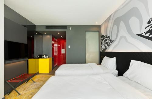 Cama o camas de una habitación en ibis Styles Istanbul Merter