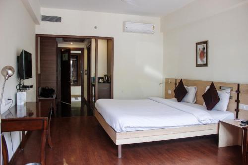 Katil atau katil-katil dalam bilik di Savoy Greens Jabli