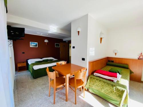Ein Bett oder Betten in einem Zimmer der Unterkunft Residence Pizzo Scalino