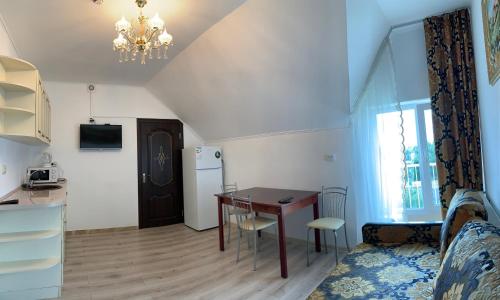 Televízia a/alebo spoločenská miestnosť v ubytovaní Appartments near 7 km 5001155