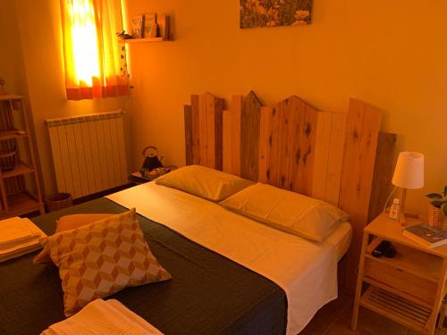 Ένα ή περισσότερα κρεβάτια σε δωμάτιο στο Agriostello Riparo