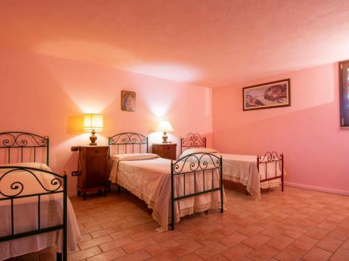 Postel nebo postele na pokoji v ubytování Holiday Home Il Vallone by Interhome