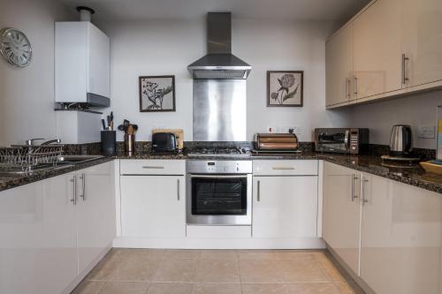 Kuchyň nebo kuchyňský kout v ubytování Astor House