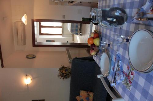 a small bathroom with a sink and a mirror at Agriturismo IL CANTINIERE in Grosseto