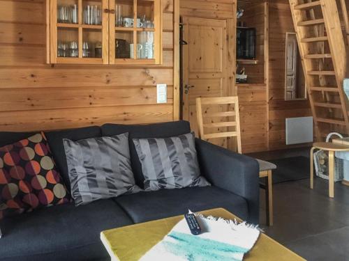Posezení v ubytování Holiday Home Lomaylläs b26 -palovaarankaarre 8 a by Interhome