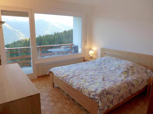 Postel nebo postele na pokoji v ubytování Apartment Grand-Large A 22 by Interhome