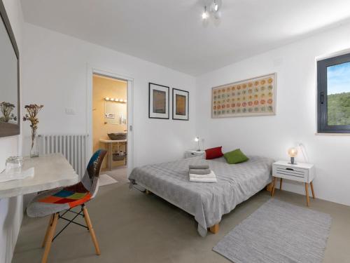 Katil atau katil-katil dalam bilik di Villa Studio Gallery Bura by Interhome