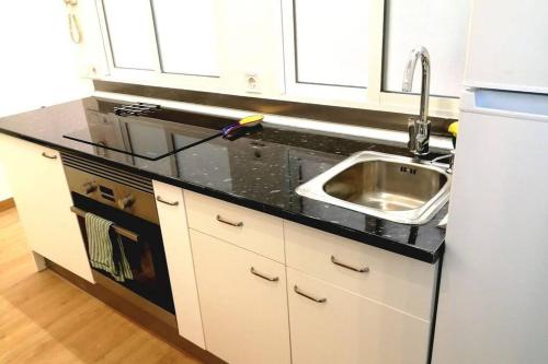 A kitchen or kitchenette at Piso VIP Anton Martin. Madrid Centro.