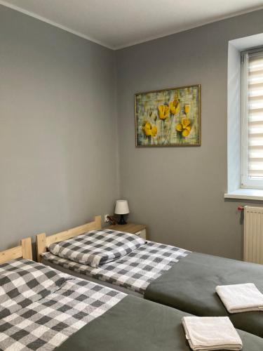 Katil atau katil-katil dalam bilik di Hostel Karpacki Szymon Szczepan