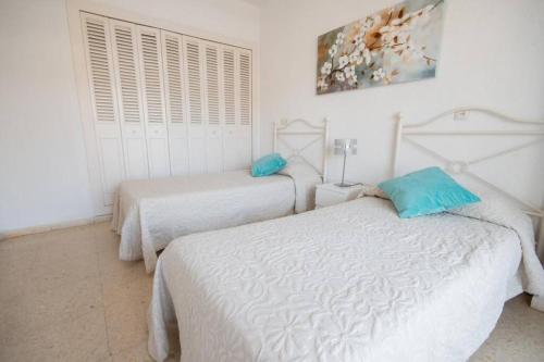 Cama o camas de una habitación en Fuengirola Ronda 3