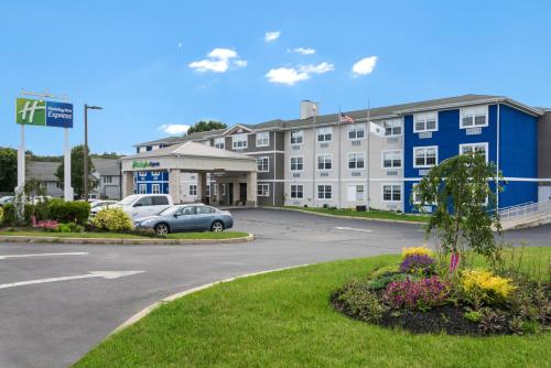 a view of a hotel with a parking lot at Holiday Inn Express - Plymouth by IHG in Plymouth