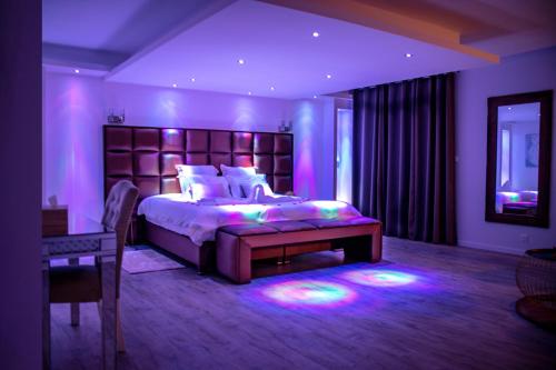 Un pat sau paturi într-o cameră la Spalace