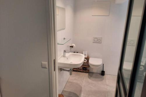 Koupelna v ubytování Have a nice stay! - Souterrain Edelweiss