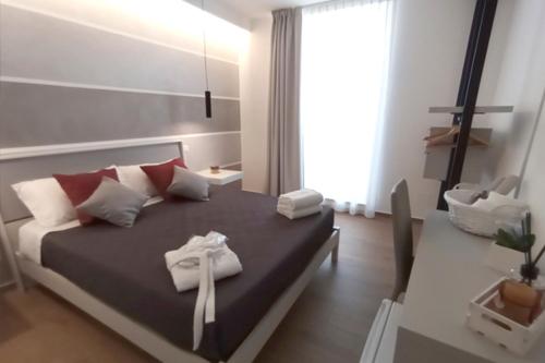 Postel nebo postele na pokoji v ubytování B&B LE MUSE